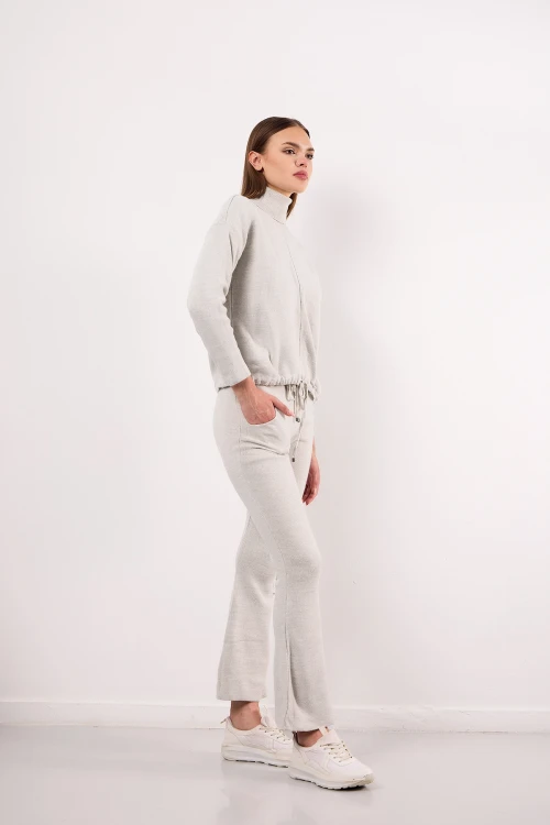 Beli Lastikli ve Bağlama Detaylı Cepli İspanyol Paça Triko Pantolon