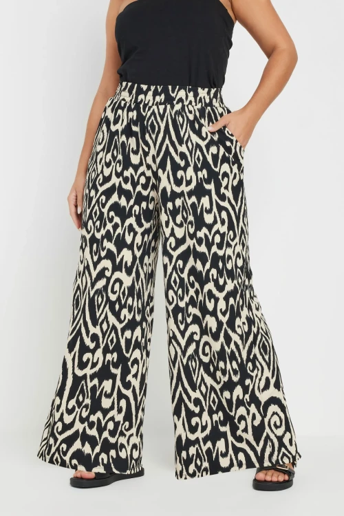 Büyük Beden Beli Lastikli Cepli Bol Paça Bilek Boy Pantolon 303653